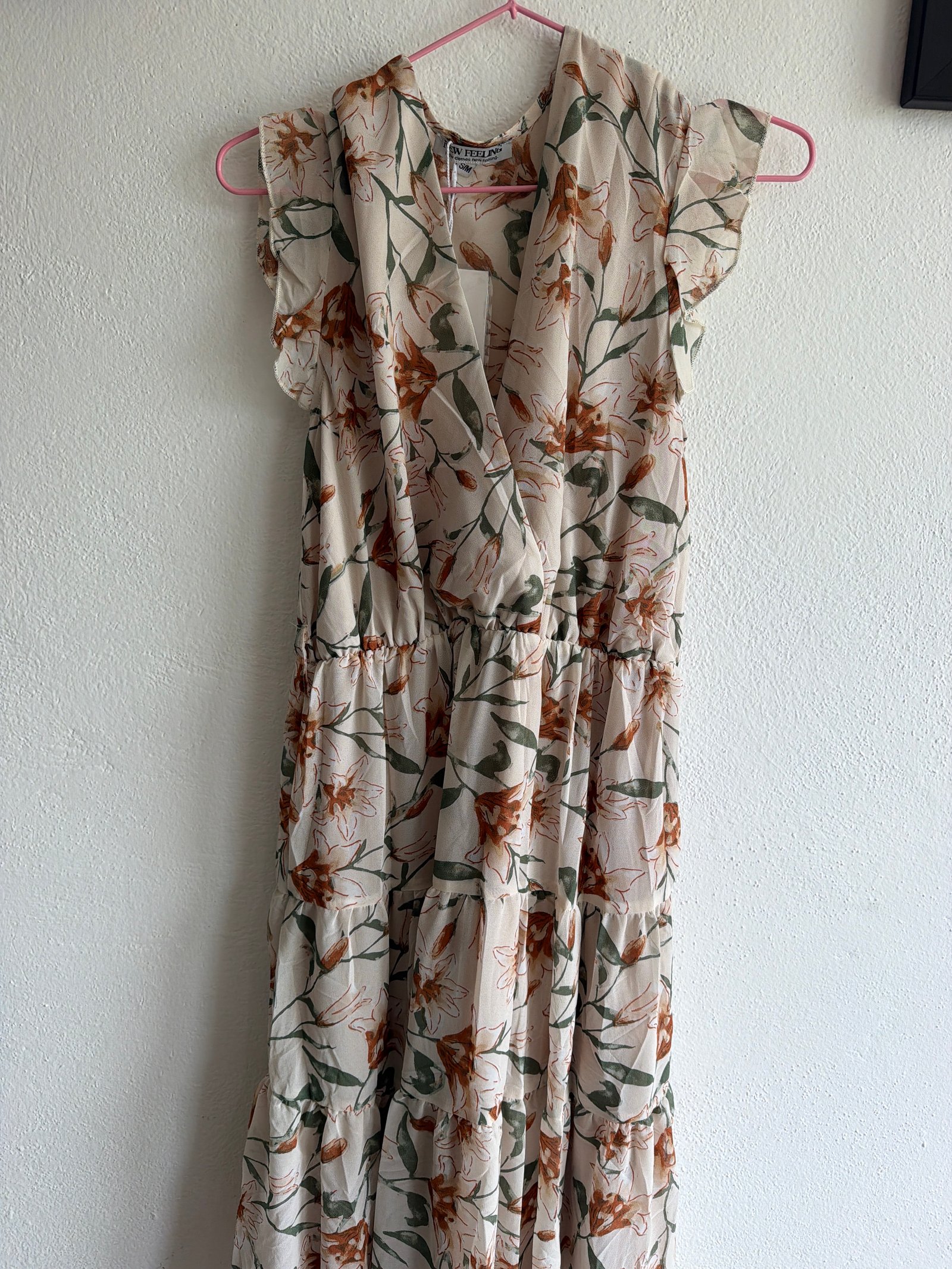 Vestido beige con flores café lijero